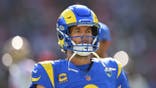 Matthew Stafford warms up before an NFL game at the Melbourne Cricket Ground.