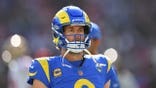 Matthew Stafford of the Los Angeles Rams warms up before an NFL game.