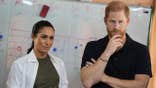 Duke and Duchess of Sussex listen during a music class at a refugee camp.