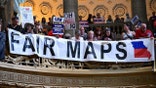 People gather at the Missouri statehouse in Jefferson City, Missouri, on Wednesday, Sept. 10, 2025, to protest the legislature's efforts to change the state's congressional district maps. The proposed change would divide Kansas City into districts that would include vast rural areas of the state. (Tammy Ljungblad/The Kansas City Star/Tribune News Service via Getty Images)