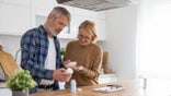 Older couple taking pills