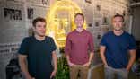 Jon Lovett, Tommy Vietor and Jon Favreau pose together for a portrait.