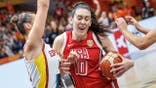Raquel Carrera and Breanna Stewart battle for the ball during Women's Basketball World Cup semifinal.