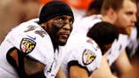 Ray Lewis #52 of the Baltimore Ravens looks on from the bench during Super Bowl XLVII.
