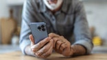 Person holding a smartphone.