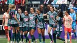 Tara Rudd celebrates with teammates after scoring for Washington Spirit.