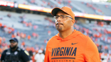 Tony Elliott leaves the field after a game at Scott Stadium.