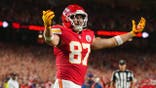 Travis Kelce celebrates after scoring a touchdown against the Indianapolis Colts.