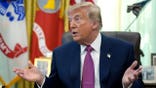 President Donald Trump speaks in the Oval Office.