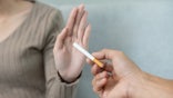 Woman refusing cigarette