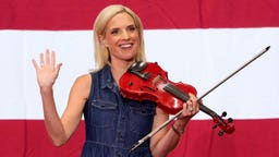 Iowa Republican U.S. Senate candidate, Rep. Ashley Hinson (R-IA) plays the violin during her BBQ fundraiser at the Horizon Events Center on August 29, 2026 in Clive, Iowa.
