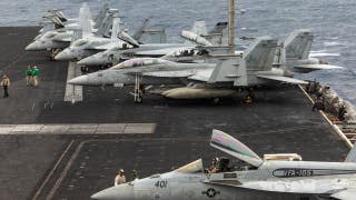 2 Navy aviators eject during landing 'mishap' aboard USS Eisenhower, injuring 4 sailors