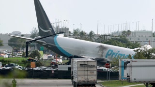 Amazon cargo plane overruns Miami airport runway and strikes 'multiple' vehicles; 5 dead, 5 injured