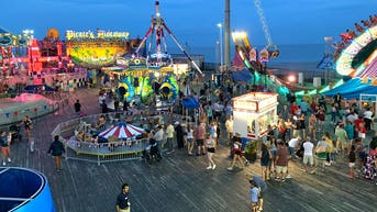 Frightening scene unfolds on iconic sky ride as child falls down onto boardwalk - Fox News