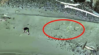 Tourists seeking 'dramatic' photo on isolated beach trapped by incoming tide - Fox News