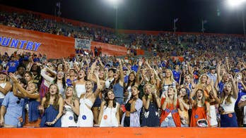 Viral Florida Gators fan comes forward after cameras noticed her 'work the cut' in The Swamp