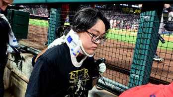 Photographer hit in head with hard foul ball at Yankees-Angels game, carted off in scary scene