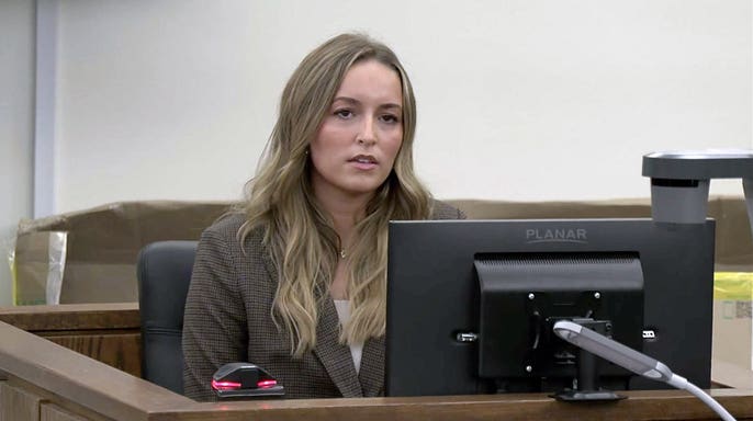 Alleigha Botner sits on the witness stand while testifying in Caleb Flynn's Ohio murder trial.