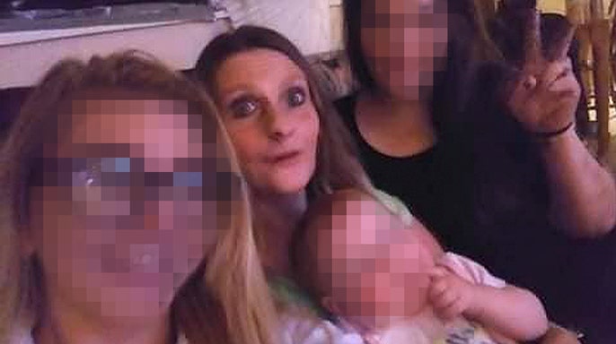 angela lipps with family in living room