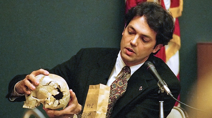 Dr. Murray Marks holds the victim's shattered skull at Christa Pike's murder trial in 1996