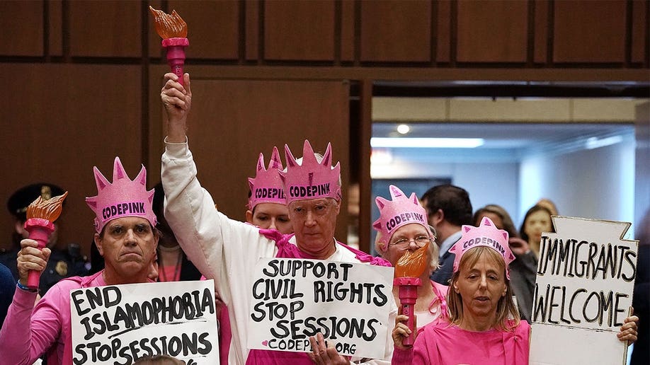 codepink-protest-jeff-sessions-senate-hearing-2017.jpg