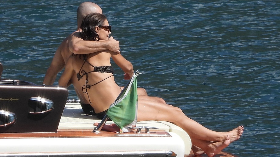 Holmes and Yarmosky couldn't keep their hands off one another as they vacationed in Italy.
