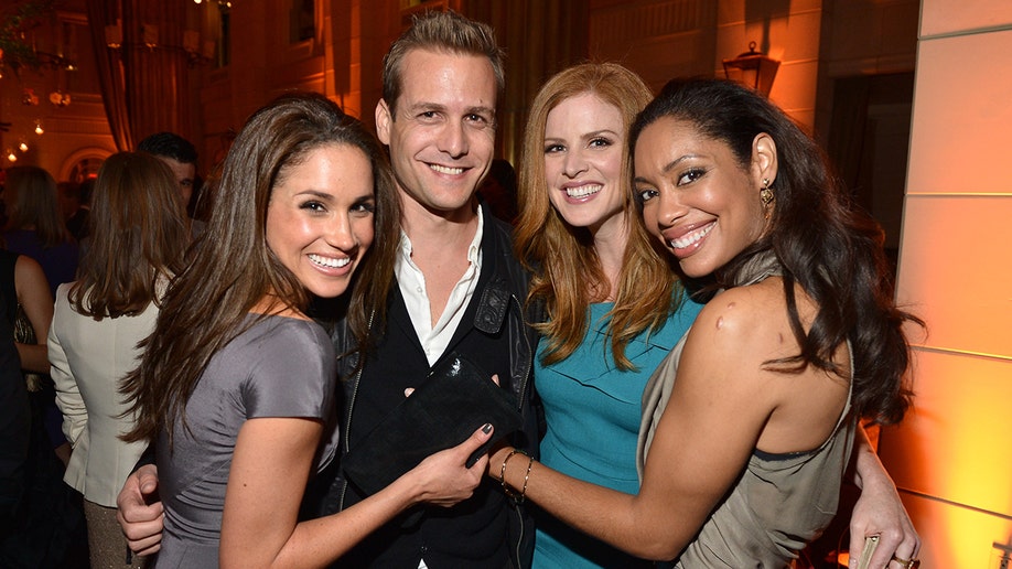 Meghan Markle with her cast mates from "Suits" at an event in 2012.