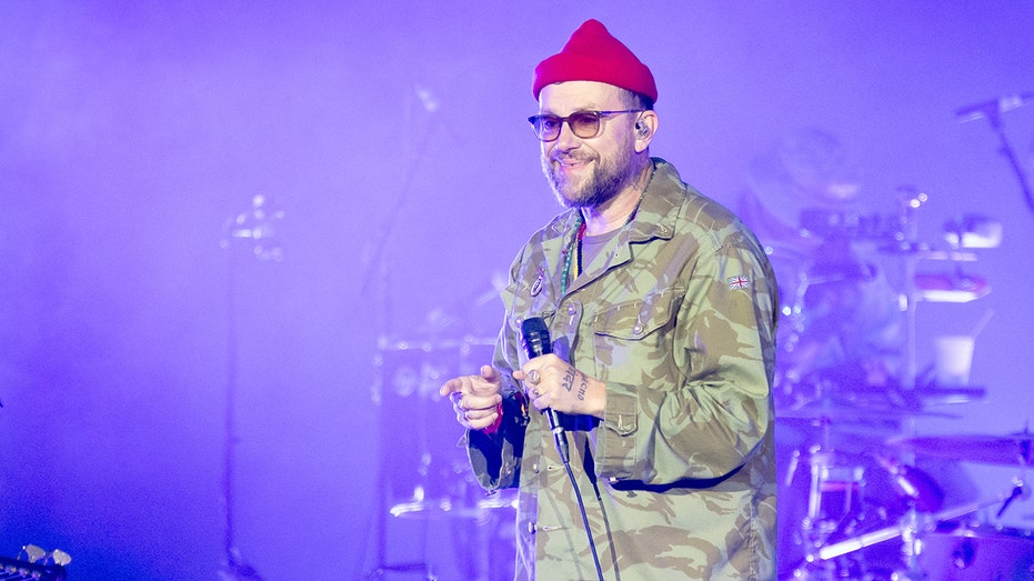 Gorillaz frontman Damon Albarn holds up Palestinian flag during show after Macklemore tour removal