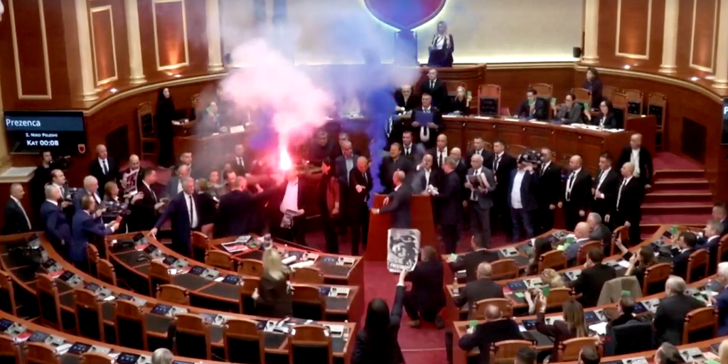 Albanian opposition lawmakers disrupt parliament with smoke flares and furious attacks on socialist PM