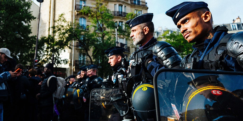 France on edge with 70,000 police deployed for unrest as authorities probe suspected terror attack near Paris