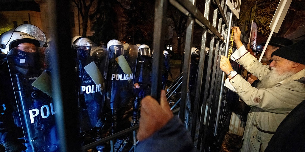 Polish president turns plane around after 'coup' at nation’s top court