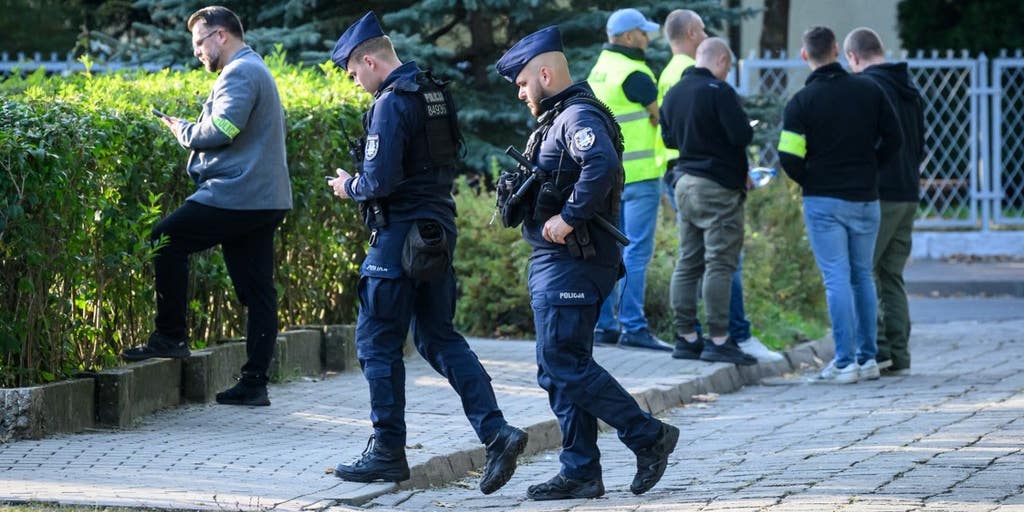 Teen wearing helmet camera kills worker at Polish school amid fears of copycat attacks