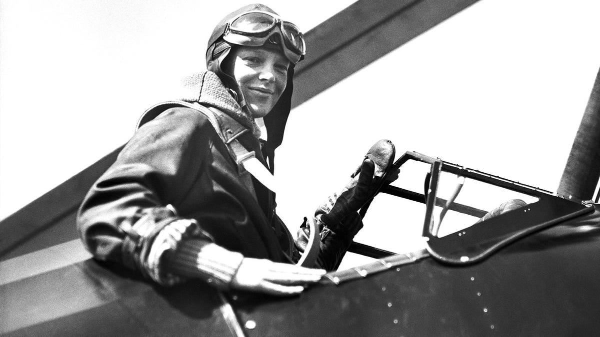 Earhart smiling in plane