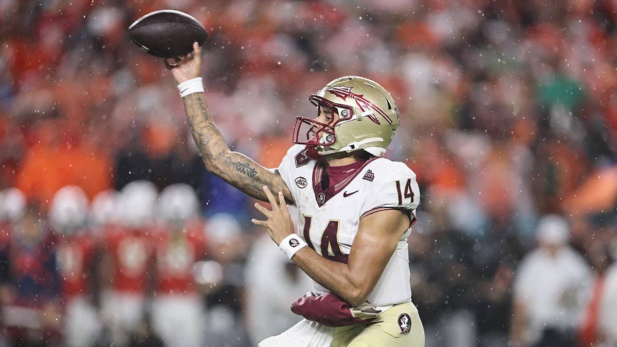 Ashton Daniels throws a pass