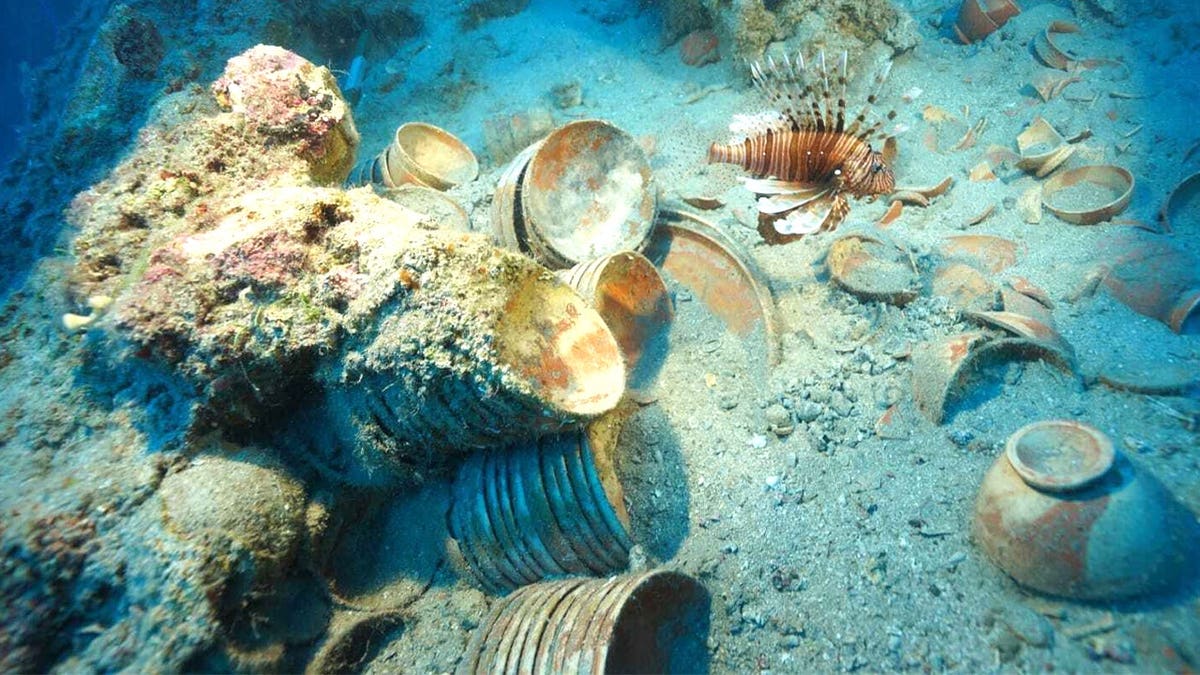 View of large quantity of ceramics on sea floor