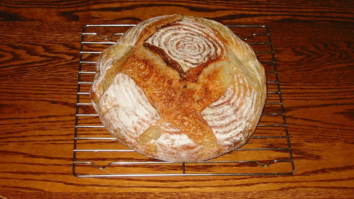 Screencaps reader CPT Kelly G sends in look at a homemade sourdough bread boule.