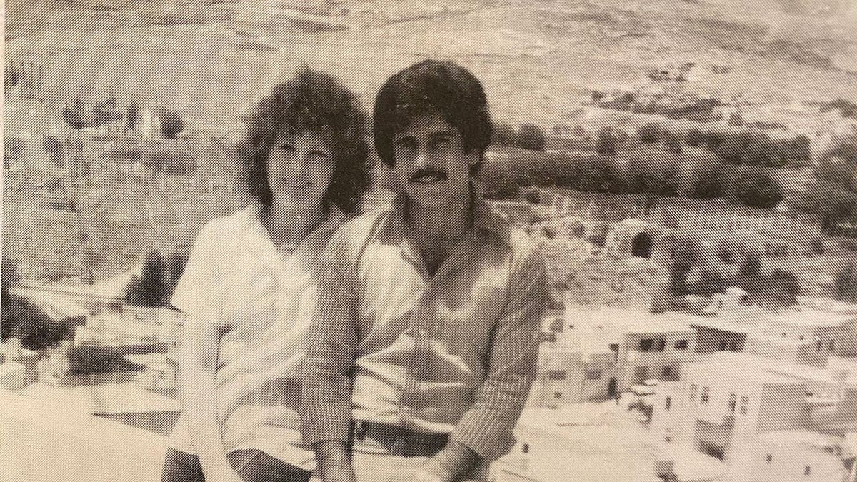 A black and white photo of Cathy Mahone and Ali Bayan.