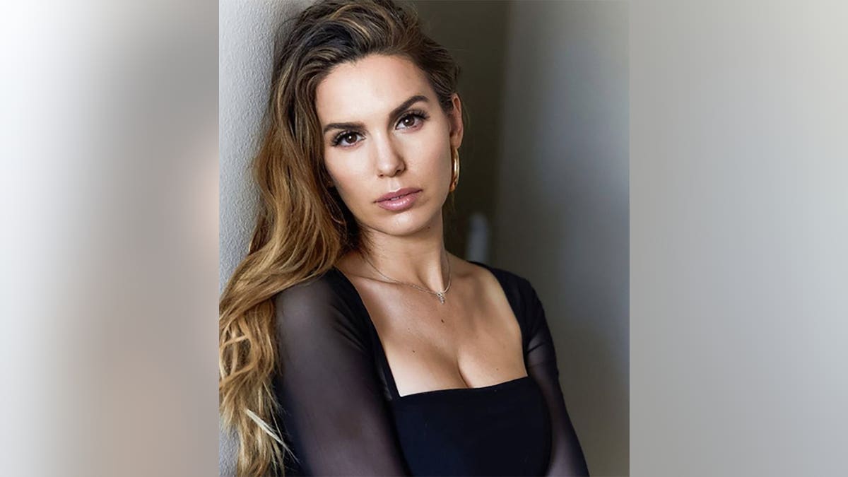 Christy Carlson Romano posing in a glamorous photoshoot.