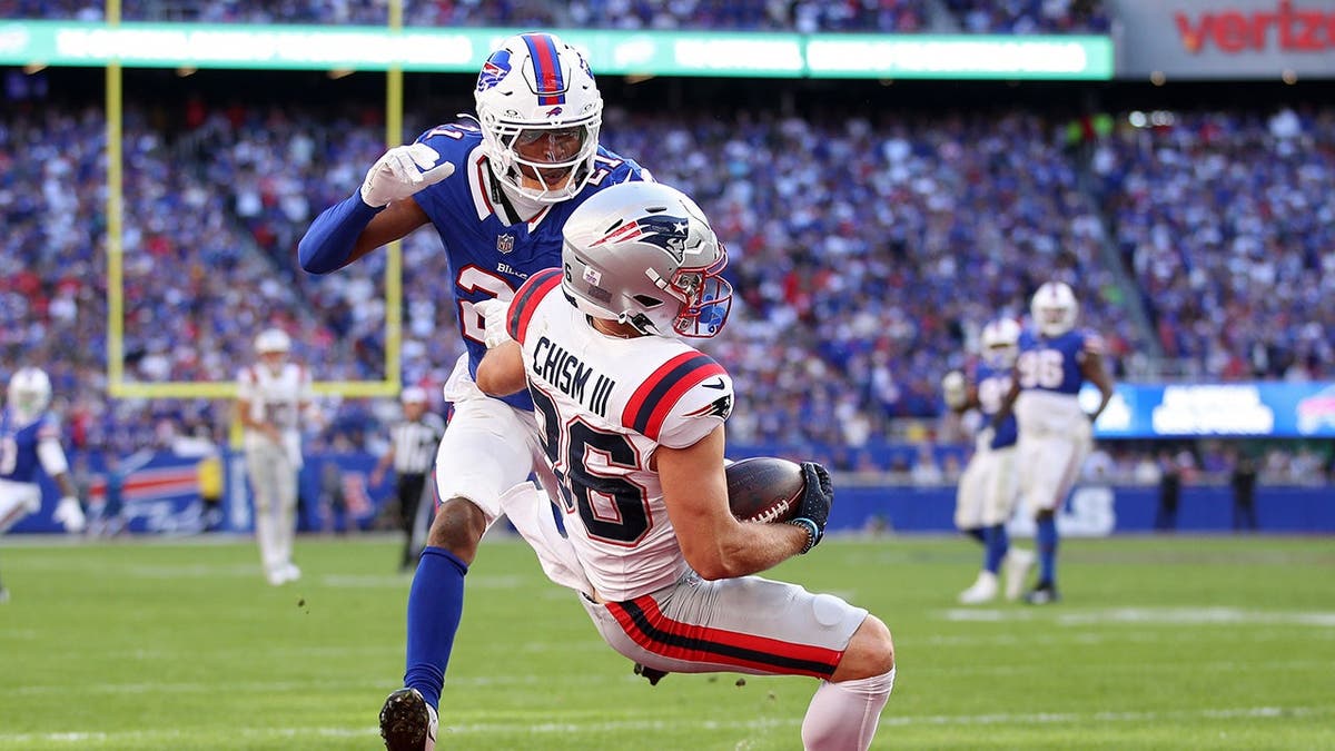 Efton Chism III scores a touchdown against the Buffalo Bills at Highmark Stadium.