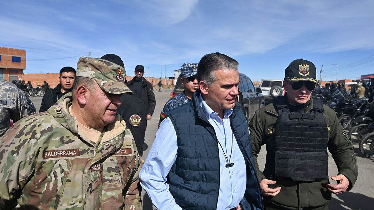 Bolivian Defense Minister Ernesto Justiniano, along with Armed Forces Commander-in-Chief General Victor Hugo Balderrama and Police Commander General Mirko Antonio Sokol