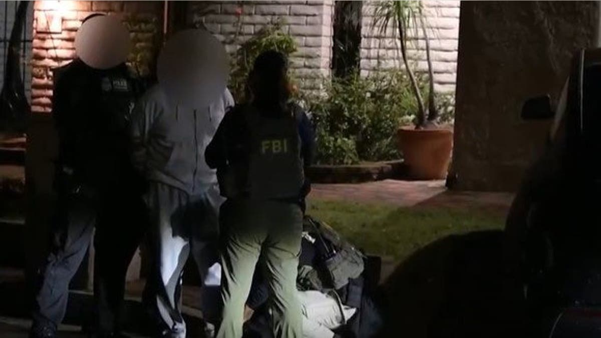 FBI agents making an arrest
