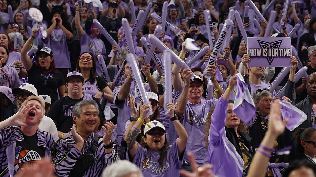 Golden State Valkyries fans cheering during a WNBA game
