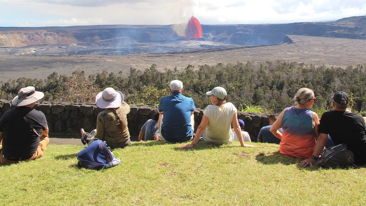 Visitors viewing an eruption at Hawaii Volcanos National Park