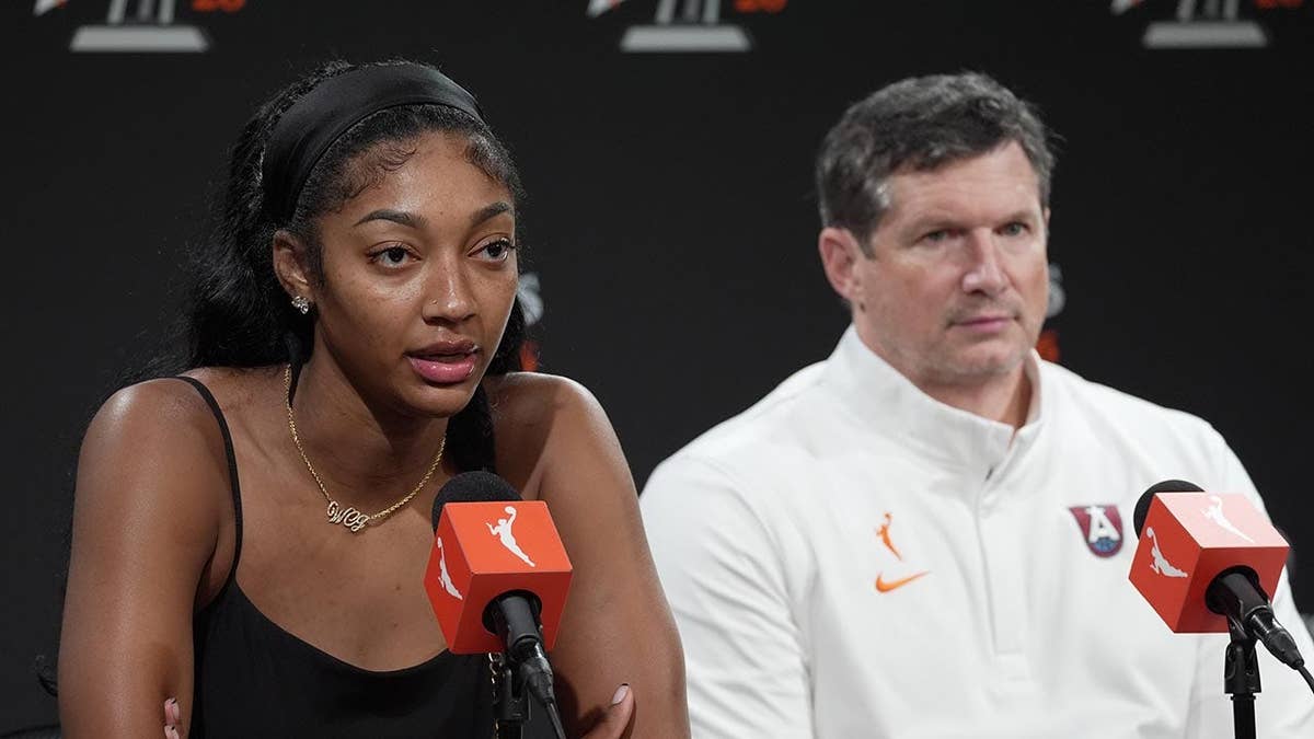 Angel Reese and Karl Smesko speaking to media after the WNBA Finals game