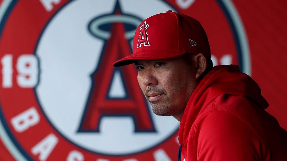 Kurt Suzuki looks on before a game at Angel Stadium