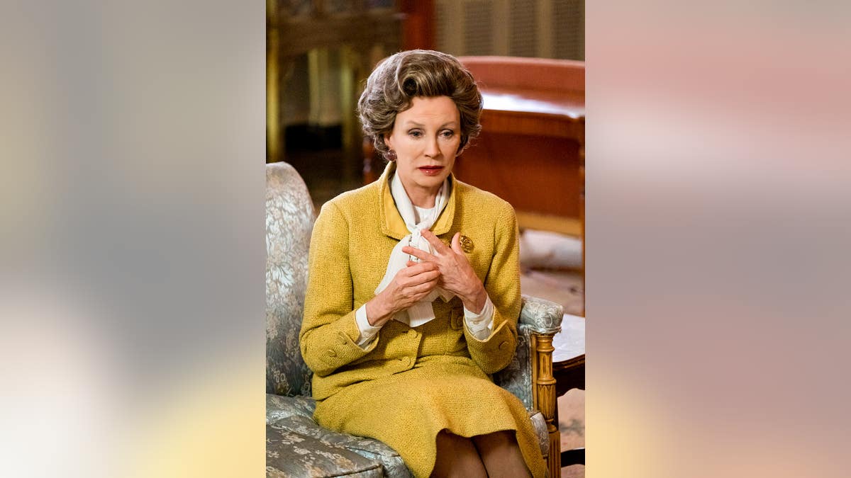 Lesley-Anne Down in a yellow suit as Thatcher.