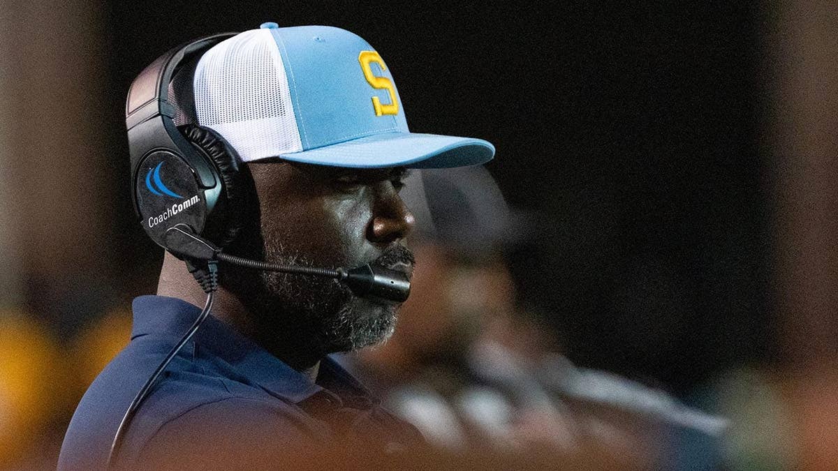 Marshall Faulk watches from the sideline during a college football game against Jackson State.