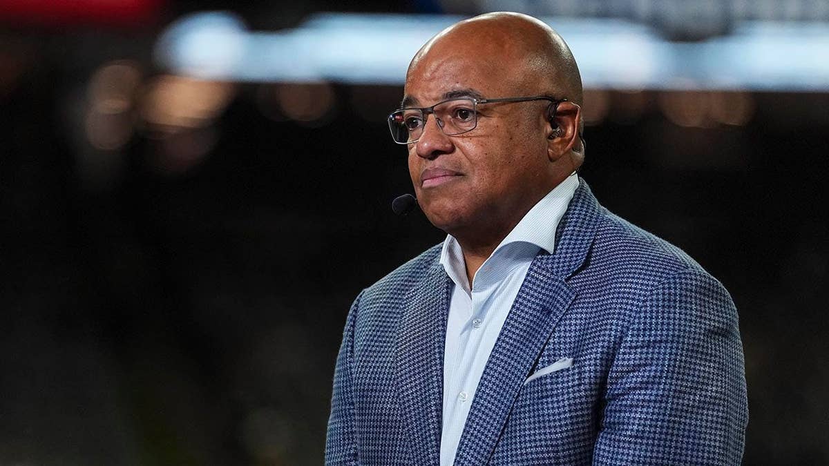 Mike Tirico looks on from set at Caesars Superdome in New Orleans