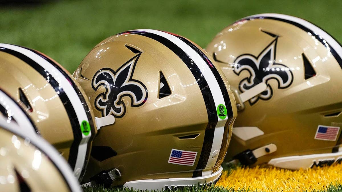 New Orleans Saints helmets sit before an NFL game