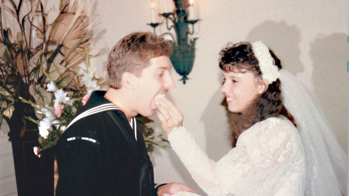 Bonnie Lou Gower serving Richard Evonitz cake on their wedding day.